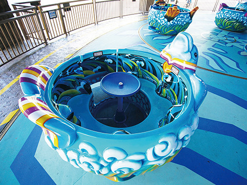 Spinning and Lifting Teacup Ride